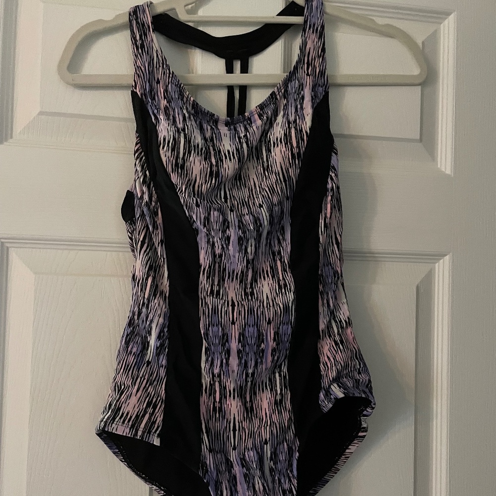 One piece pink, purple, and black print bathing suit with built in padding - SM
